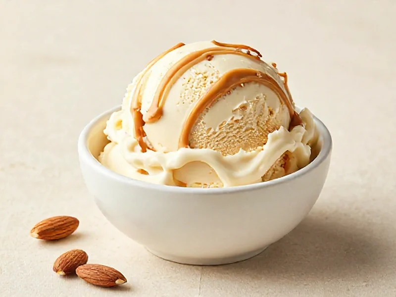 Almond Butter Swirl protein ice cream served in a cream bowl